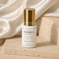 Essira Luxe Bond Pro adhesive on cream satin and travertine background